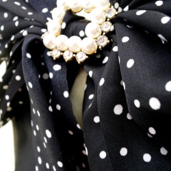 big polka dot black bow hairpin